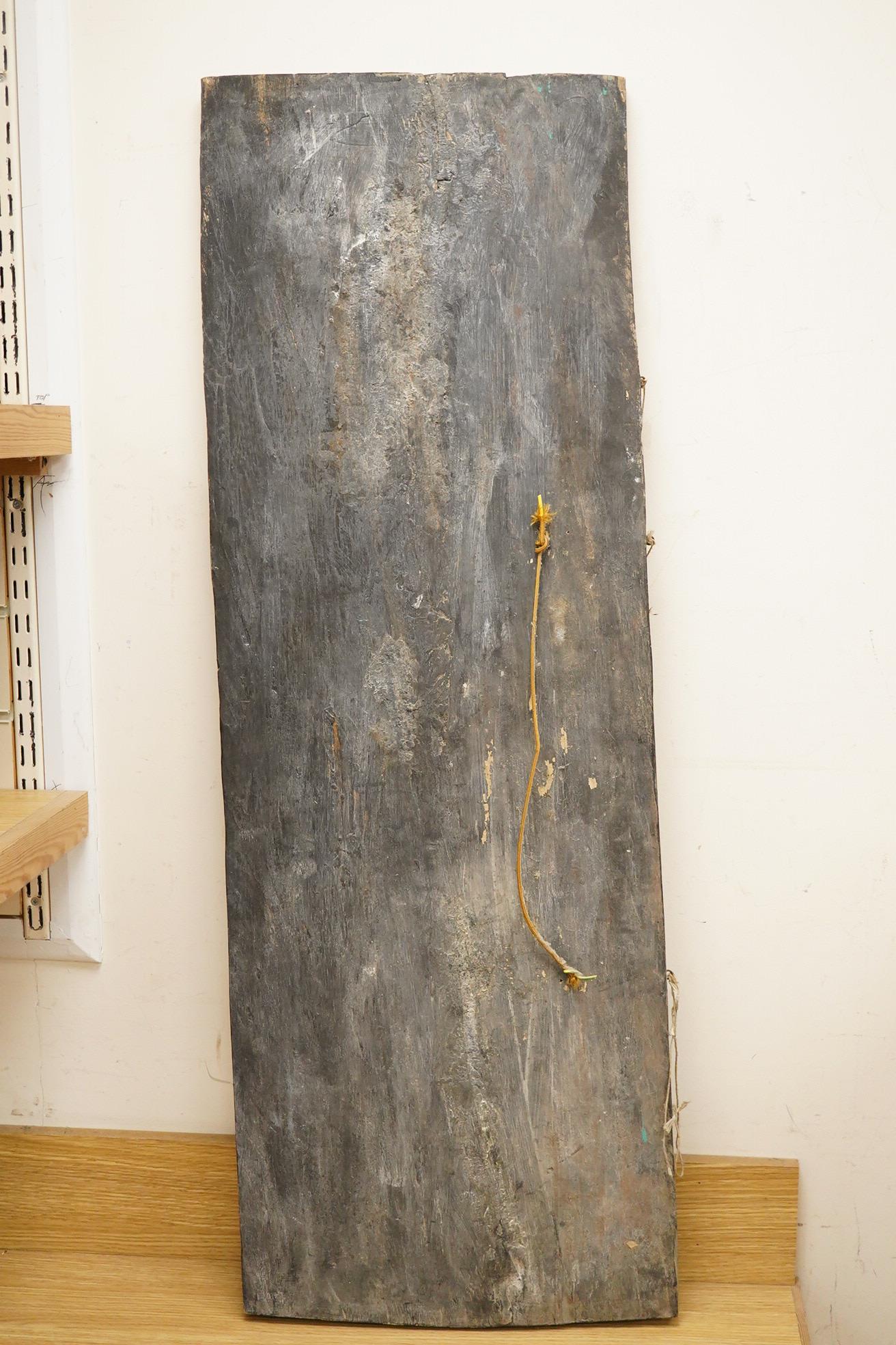 A Balinese partially gilt carved wood panel, 40 x 111cm